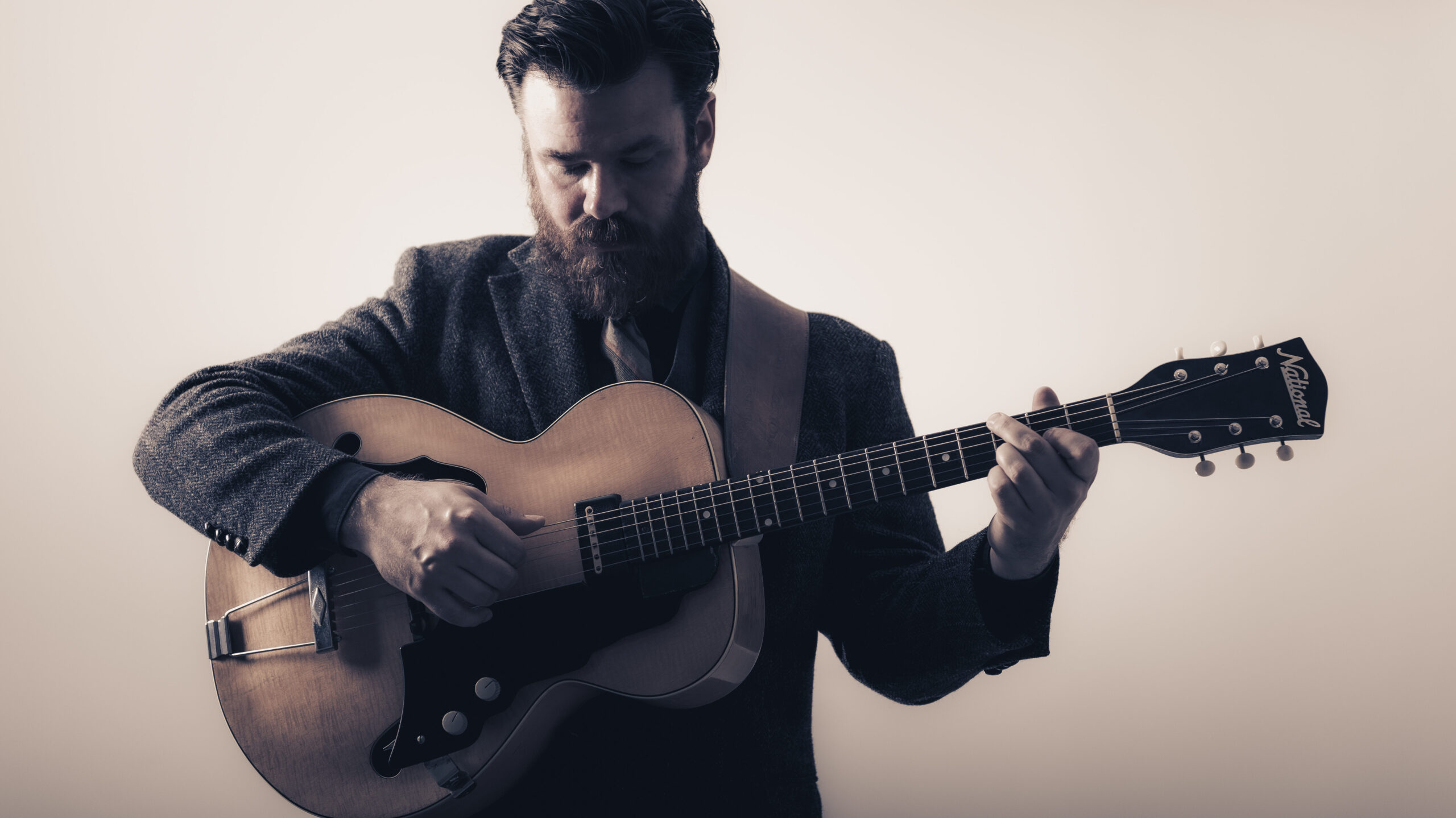 Christoffer playing a guitar